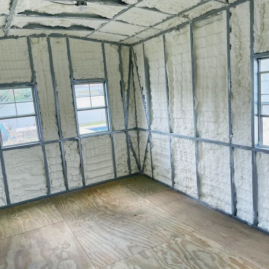 Closed-cell spray foam insulation applied to wall cavities in a residential project in Daly City